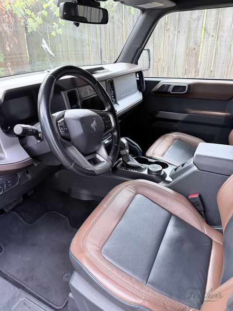 Dashboard and front seats of a Ford Bronco after cleaning