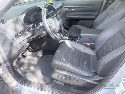 The same Honda CR-V footwell after cleaning, carpet and seat base clear